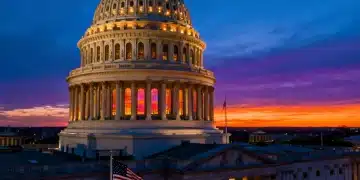United States Capitol Building at dusk, illuminated, representing legislative power.